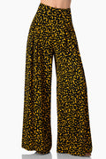 Pantalón negro de lunares amarillos con pierna amplia
