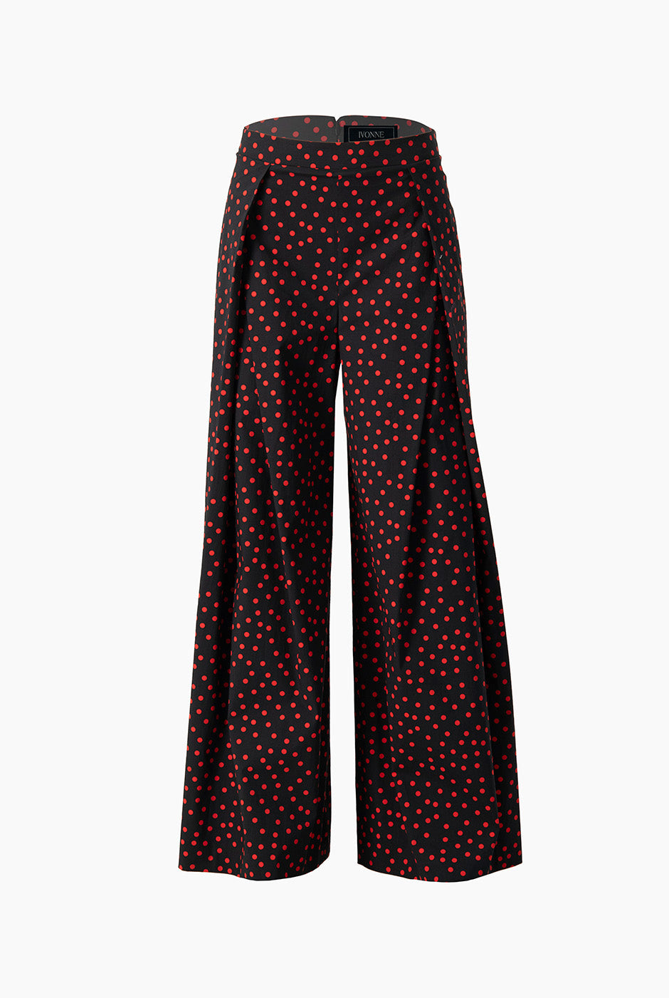 Pantalón amplio con lunares rojos sobre fondo negro